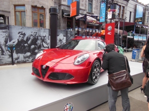 Cars being shown off at the Crescent street F1 festival
